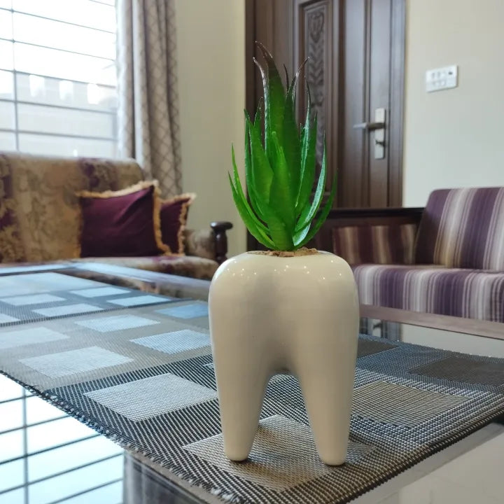 Tooth ceramic pot with artificial plant
